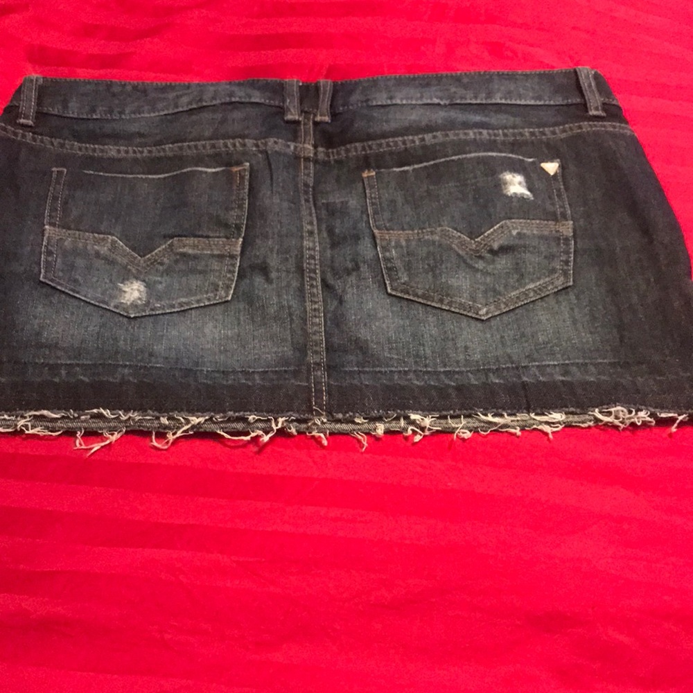Guess denim mini skirt size 34.